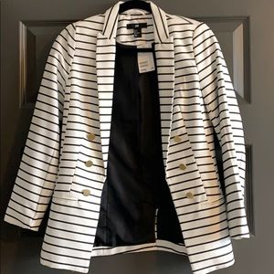 Black & white blazer with gold accent buttons